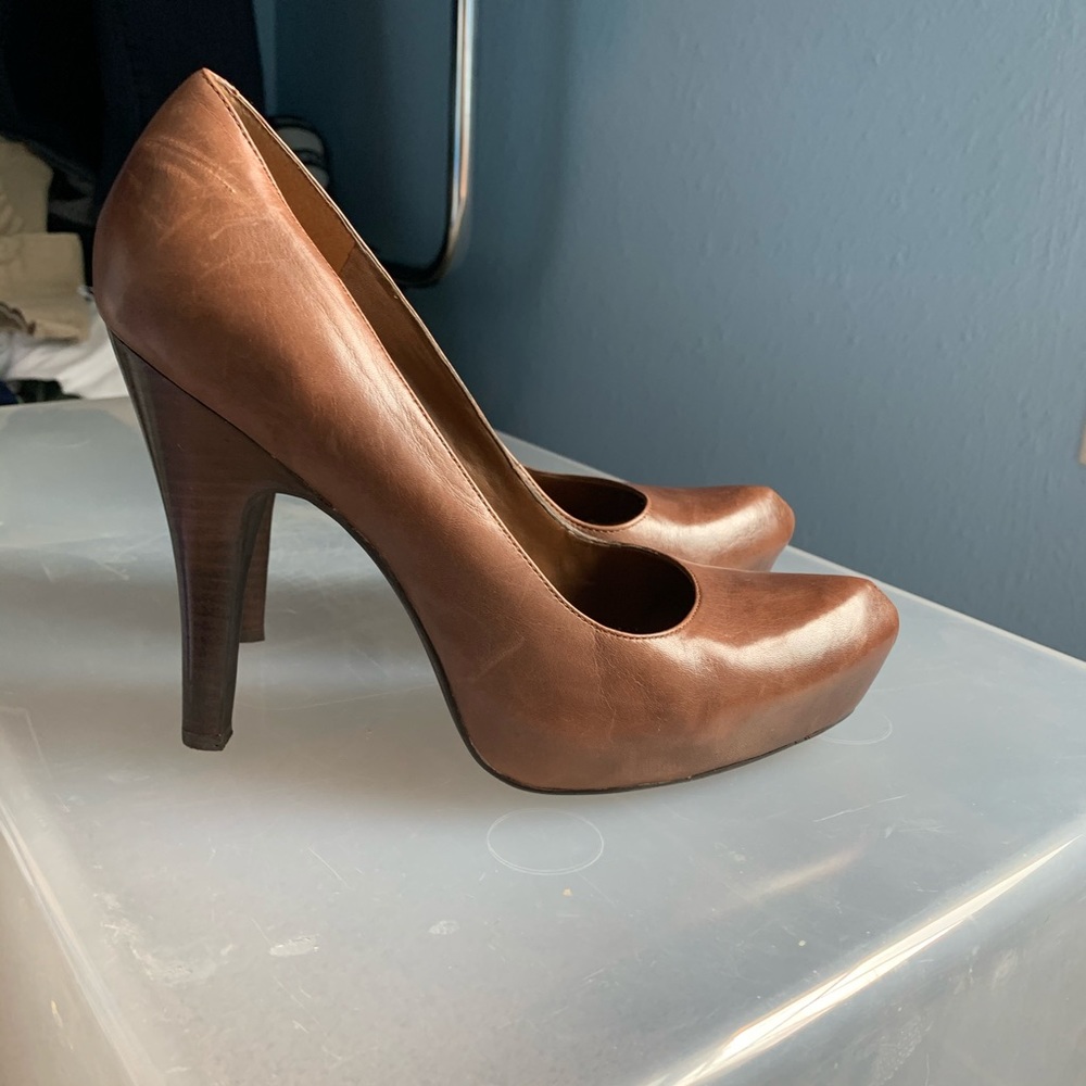 Brown leather pumps
